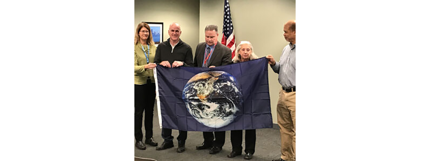 NOW Receives Earth Flags Recognizing Dedication to the Environment